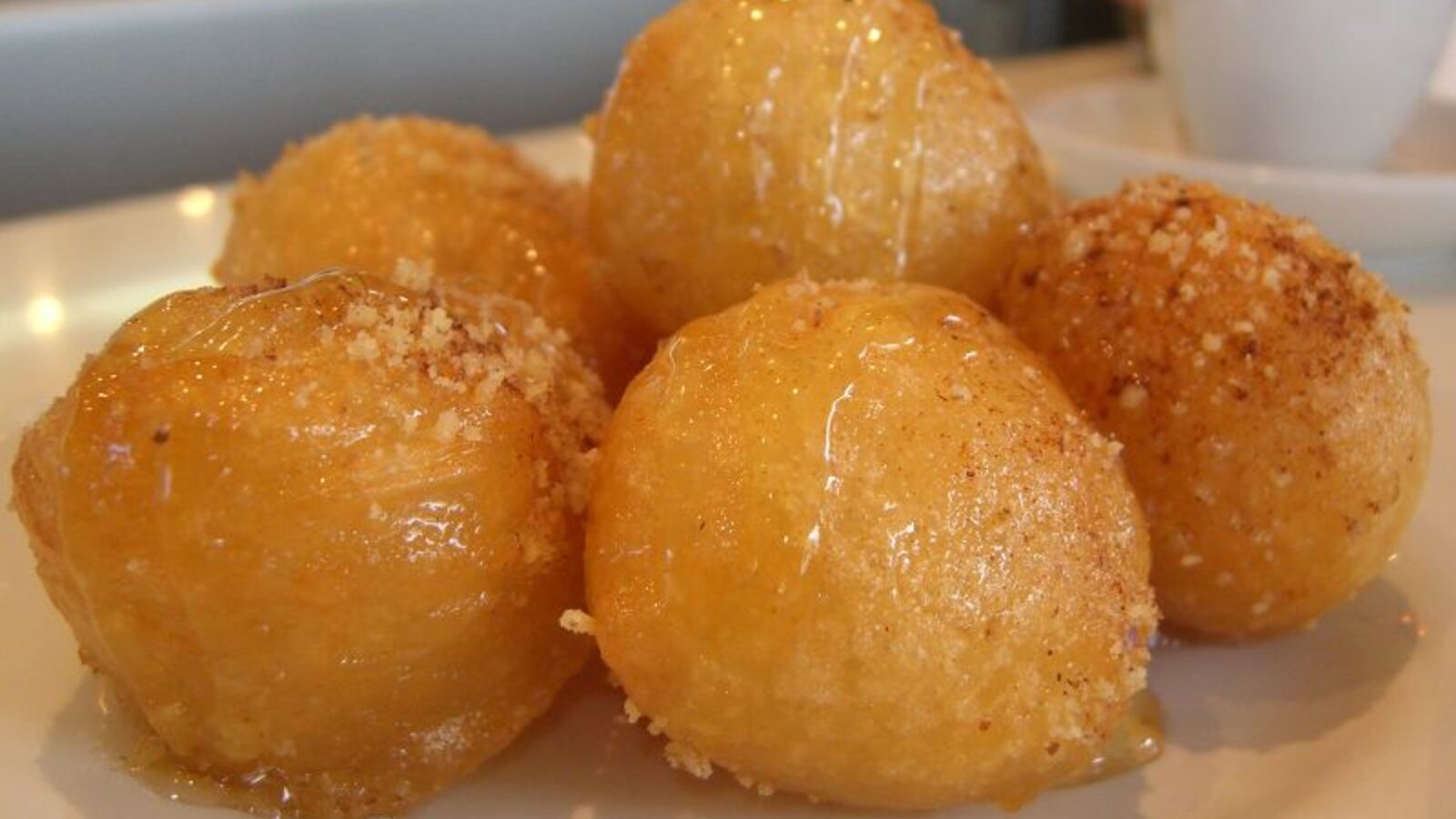 Loukoumades, golden fried dough balls soaked in syrup